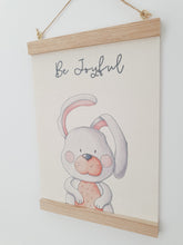 Load image into Gallery viewer, Bunny canvas print with wooden wall hanger