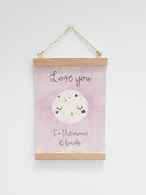 Load image into Gallery viewer, Love you to the moon canvas print with wooden hanger - Moon nursery accessory - Moon bedroom accessory - Wooden Print hanger -  Pink nursery