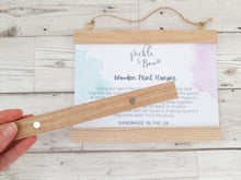 Load image into Gallery viewer, Alphabet canvas print with wooden hanger