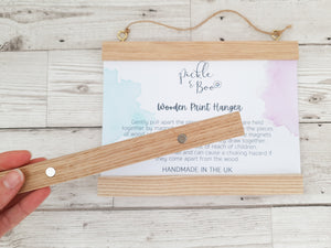 Alphabet canvas print with wooden hanger