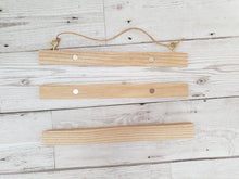Load image into Gallery viewer, Alphabet canvas print with wooden hanger