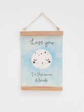 Load image into Gallery viewer, Love you to the moon canvas print with wooden hanger - Moon nursery accessory - Moon bedroom accessory - Wooden Print hanger - Blue nursery