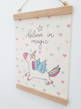 Load image into Gallery viewer, Unicorn canvas print with wooden hanger - Unicorn nursery accessory - Unicorn bedroom accessory - Wooden Print hanger - Girls Bedroom