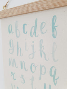 Alphabet canvas print with wooden hanger